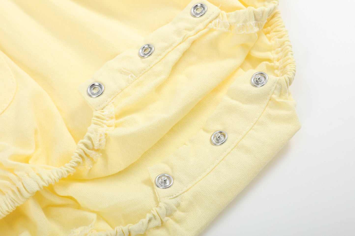 Yellow Daisy Pocketed Smocked Flutter Romper