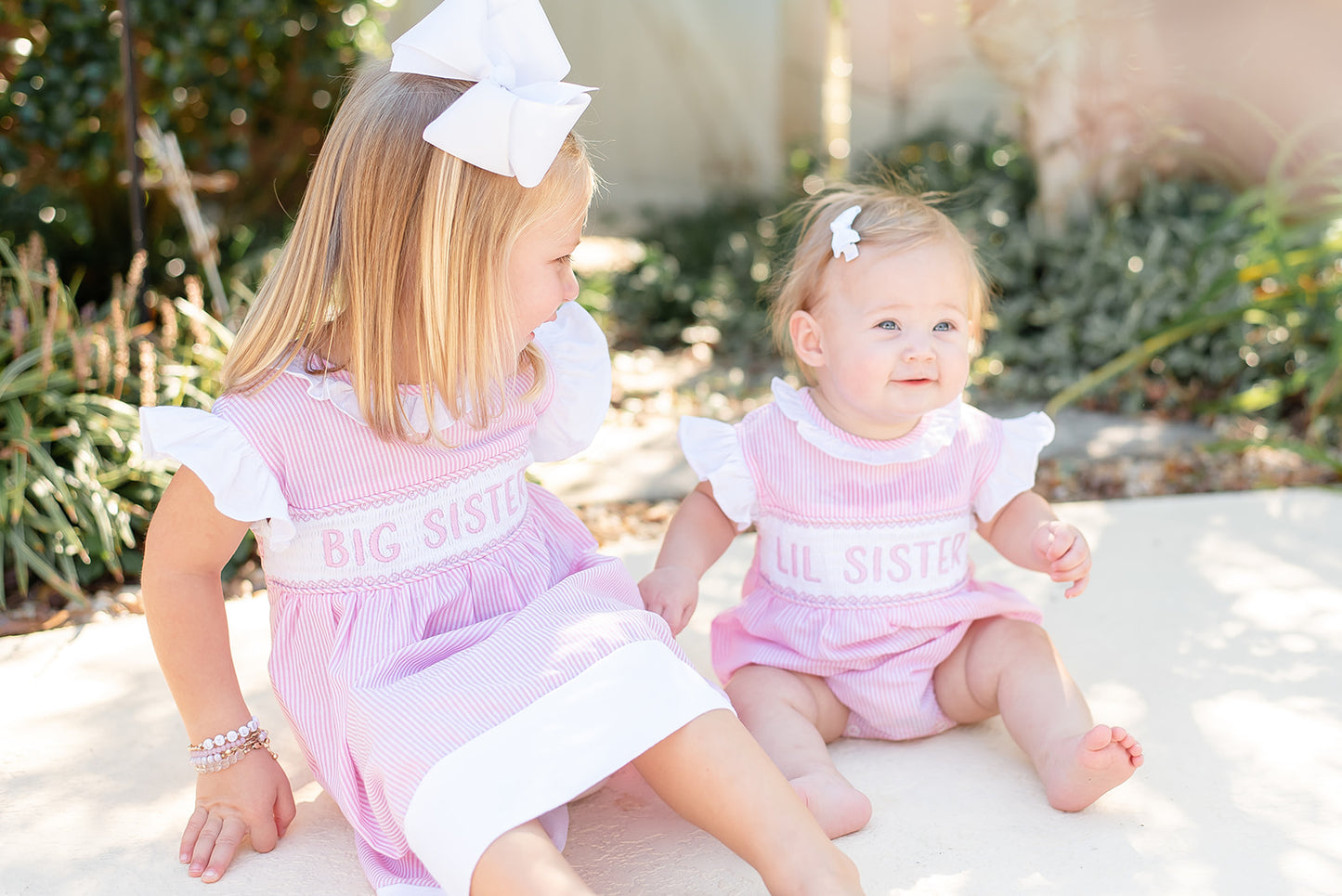 Pink Striped Lil Sister Smocked Romper
