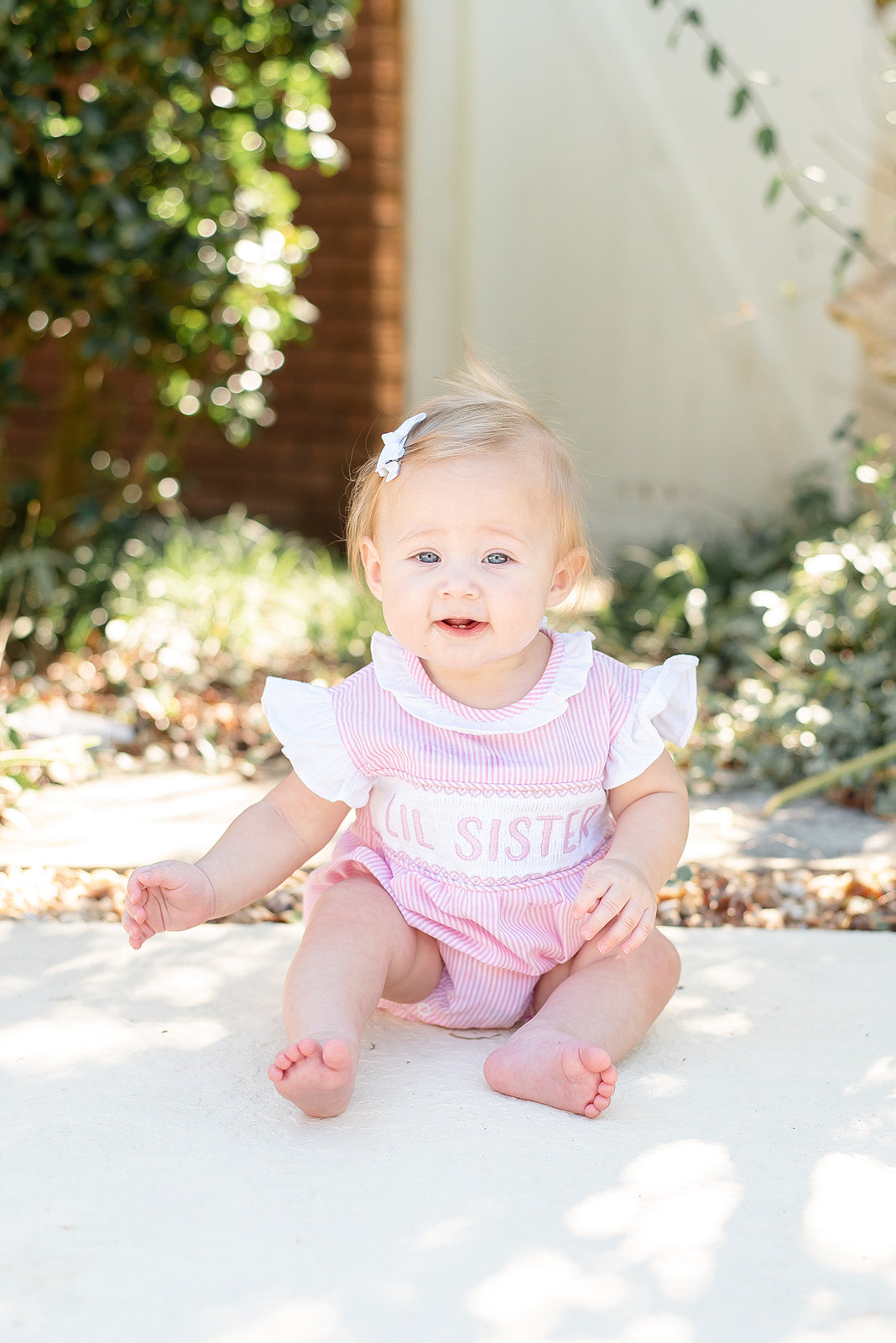 Pink Striped Lil Sister Smocked Romper