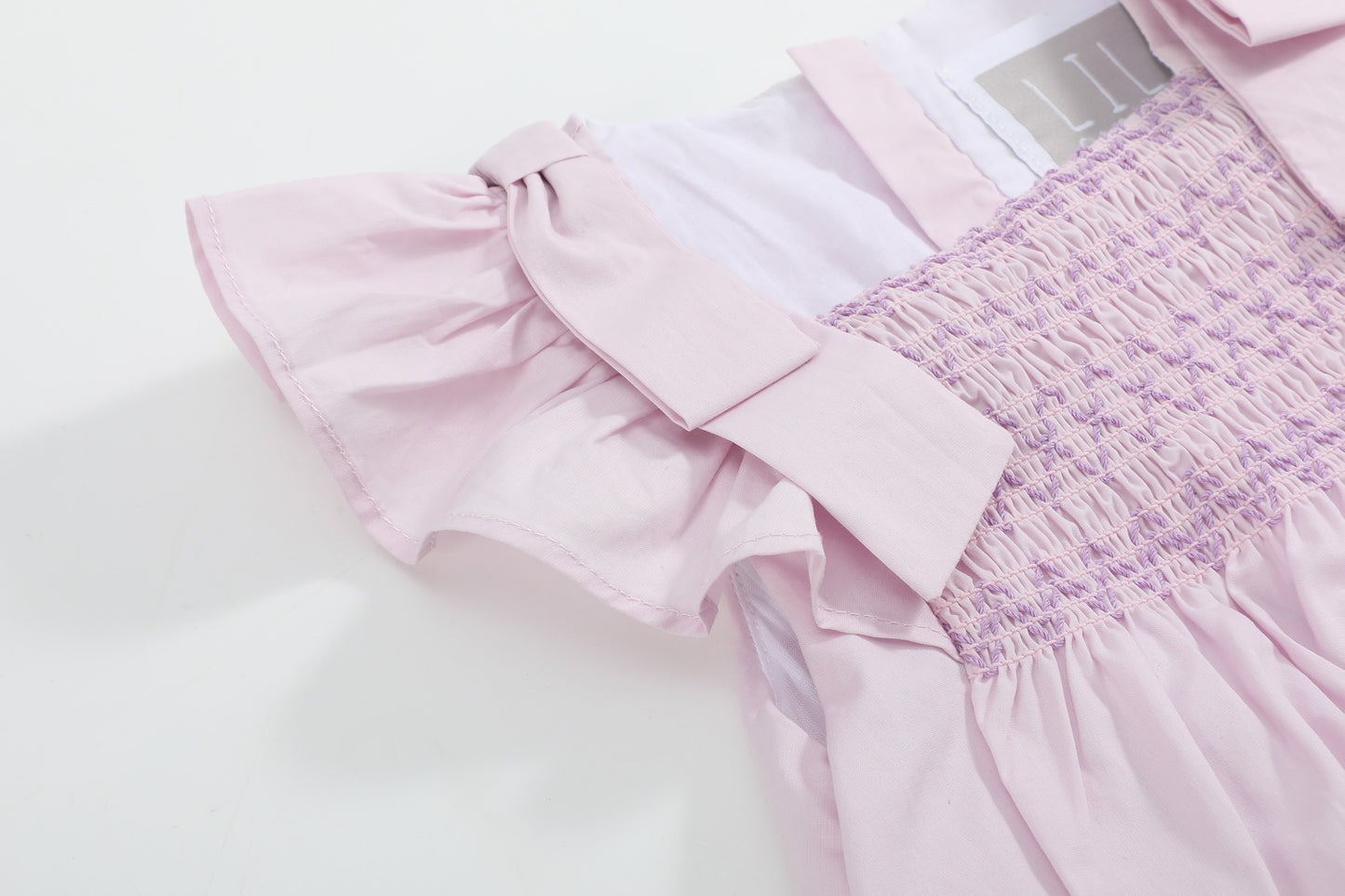 Light Purple Shoulder Bow Smocked Bubble Romper