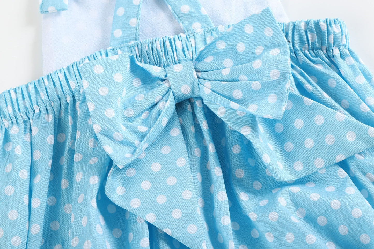 Sky Blue Dot Button and Bow Bubble Romper