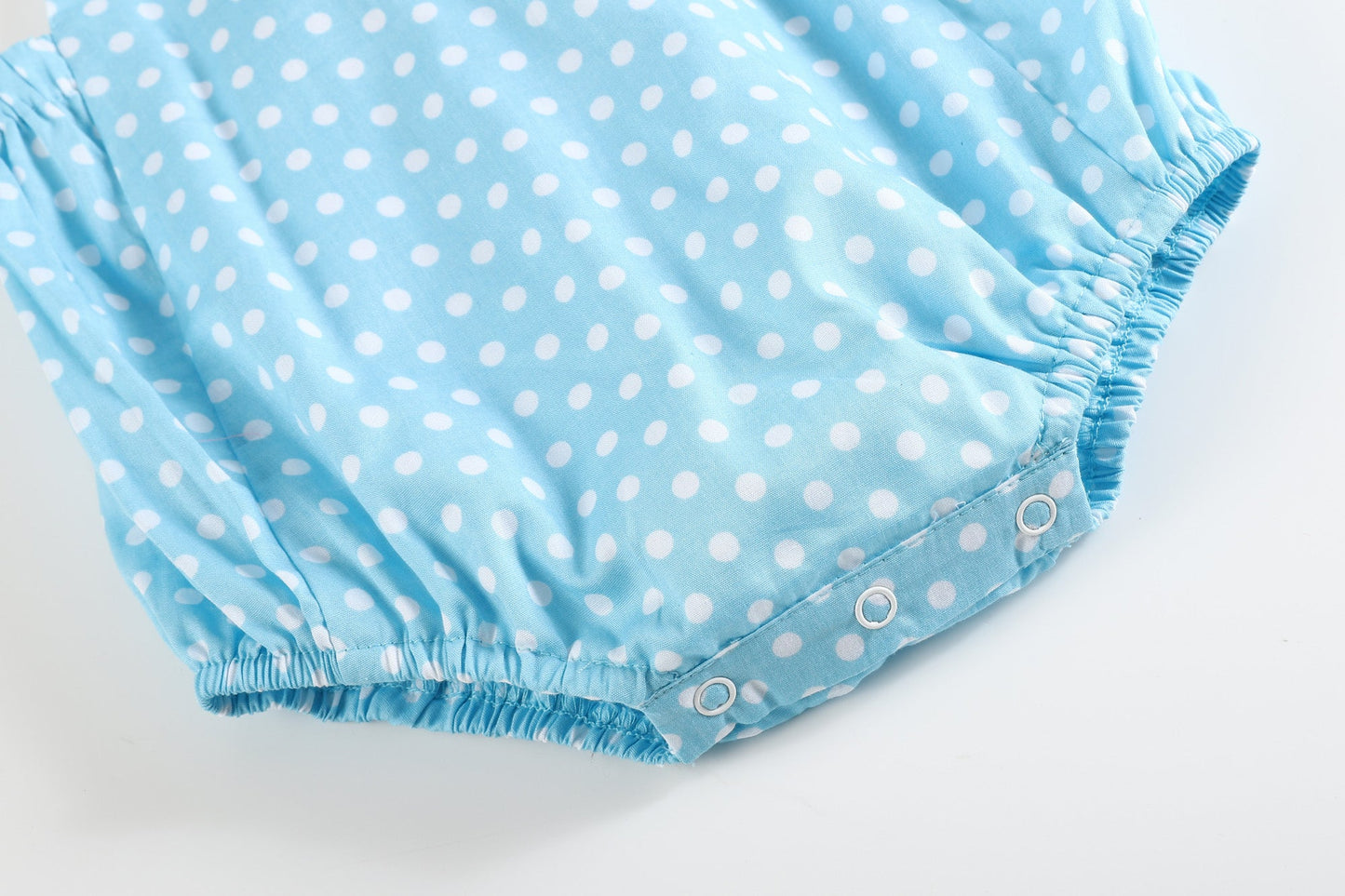 Sky Blue Dot Button and Bow Bubble Romper