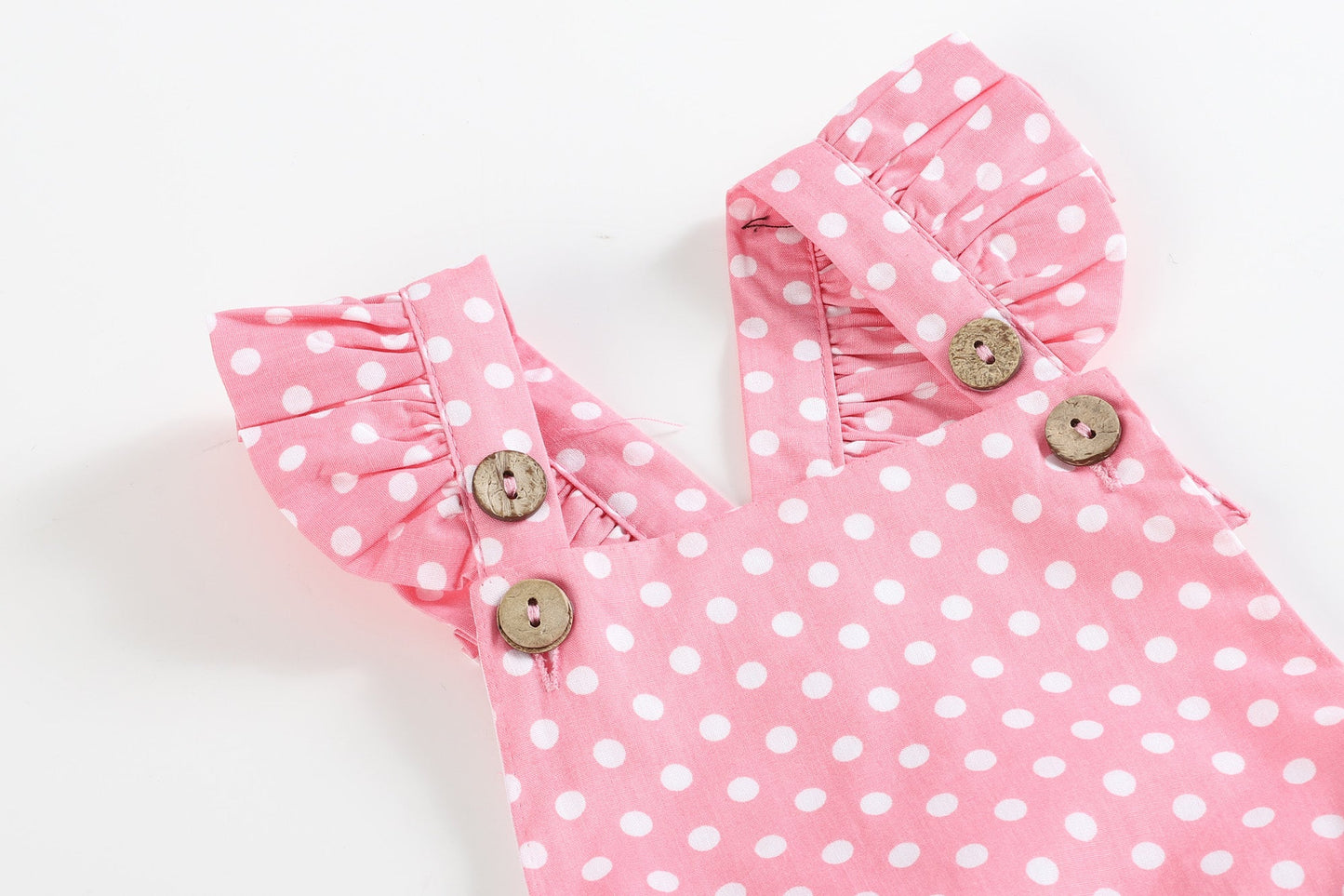 Soft Pink Dot Button and Bow Bubble Romper